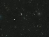 Leo galaxy cluster plus some bright stars.jpg