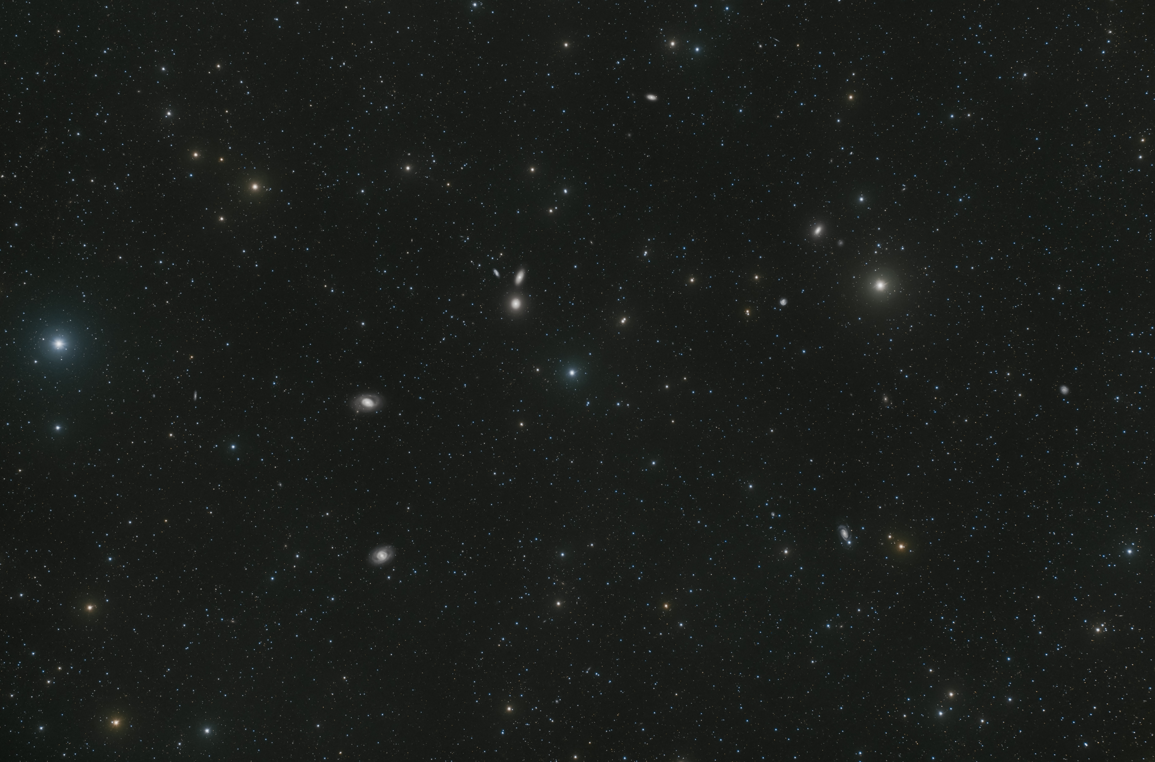 Leo galaxy cluster plus some bright stars.jpg